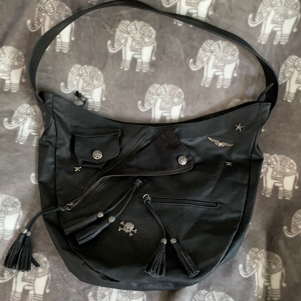Cute bag, zippred top, with buttons, skulls, pockets and zippers